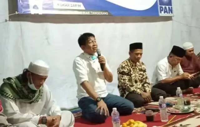 IMG-20211213-WA0032 Ukar Sar'ih Anggota DPRD Kabupaten Tangerang saat memberikan sambutannya di kegiatan reses bersama warga.