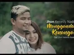Lirik Lagu Manggandeng Kenangan dan Artinya – Jhon Kenedy Nadeak Lirik Lagu Menggandeng Kenangan