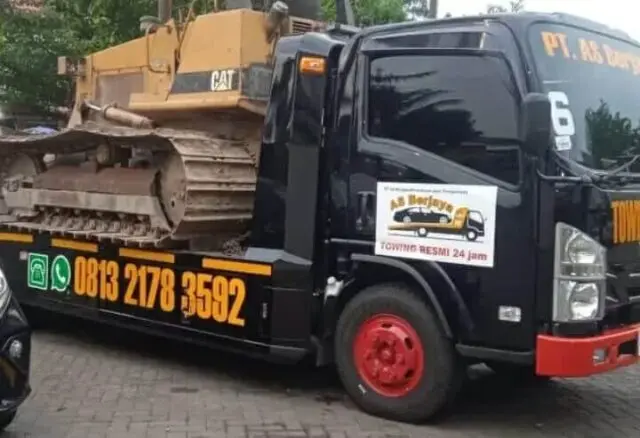 Aki Mobil Meledak Saat Isi BBM, PT AS Berjaya Minta Tanggung Jawab Pelayanan Servis ke PT AI-UD Trucks Cabang Tangerang Foto. Mobil PT AS Berjaya ini bertempat di Ruko Palmer Avenue no 15,Palem Semi, tangerang. (Istimewa)